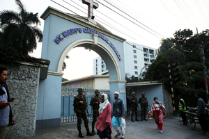 Army personnel stand guard in front of St. Mary’s Cathedral Church in Dhaka, Bangladesh, on Dec. 23, ahead of Christmas 2024.