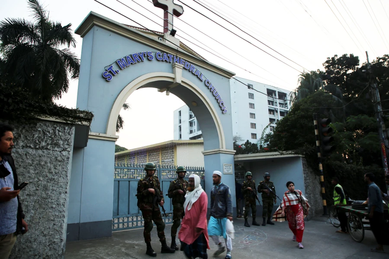 Army personnel stand guard in front of St. Mary’s Cathedral Church in Dhaka, Bangladesh, on Dec. 23, ahead of Christmas 2024.