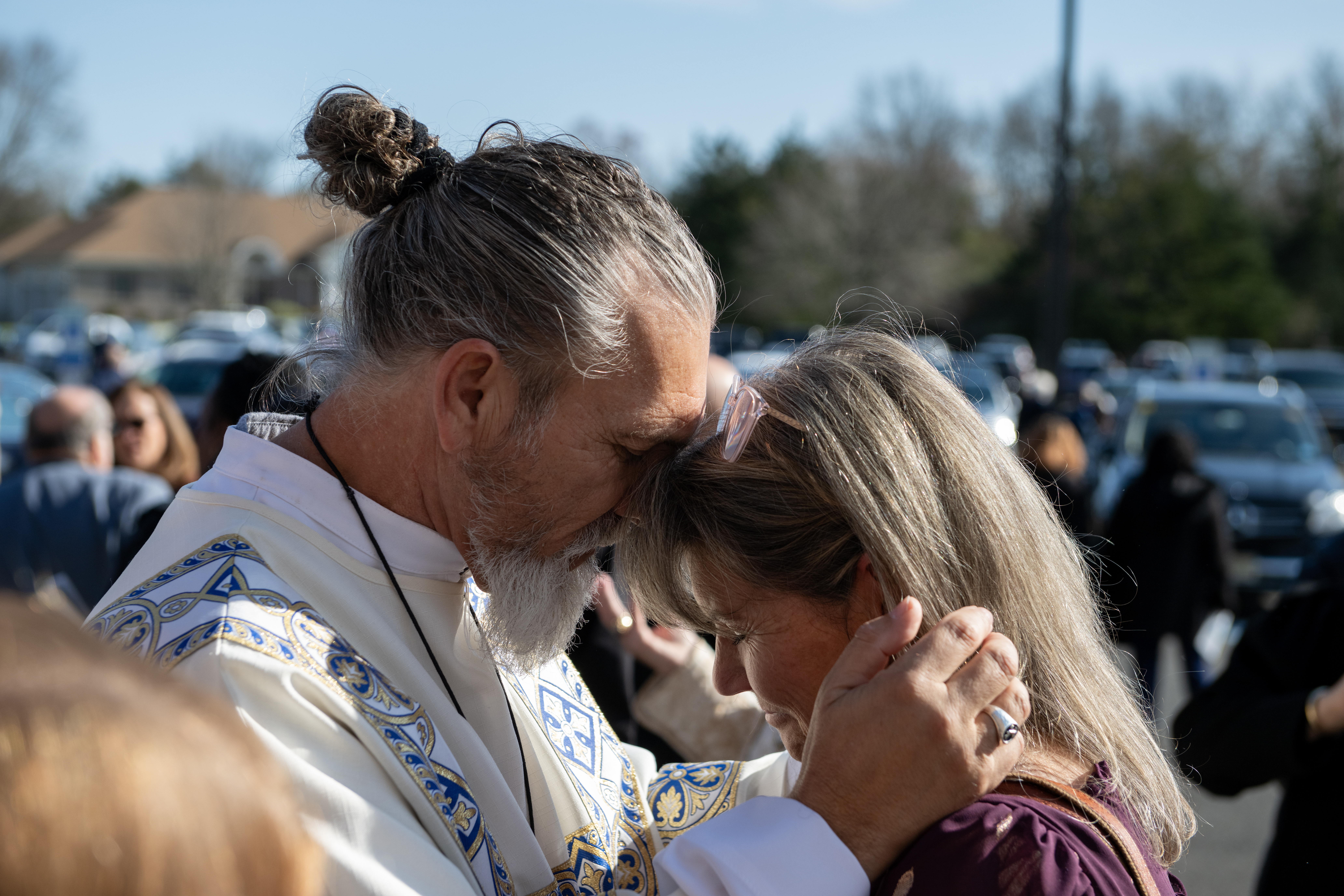 Deacon "Gez" Ford blesses his wife, Nadine.