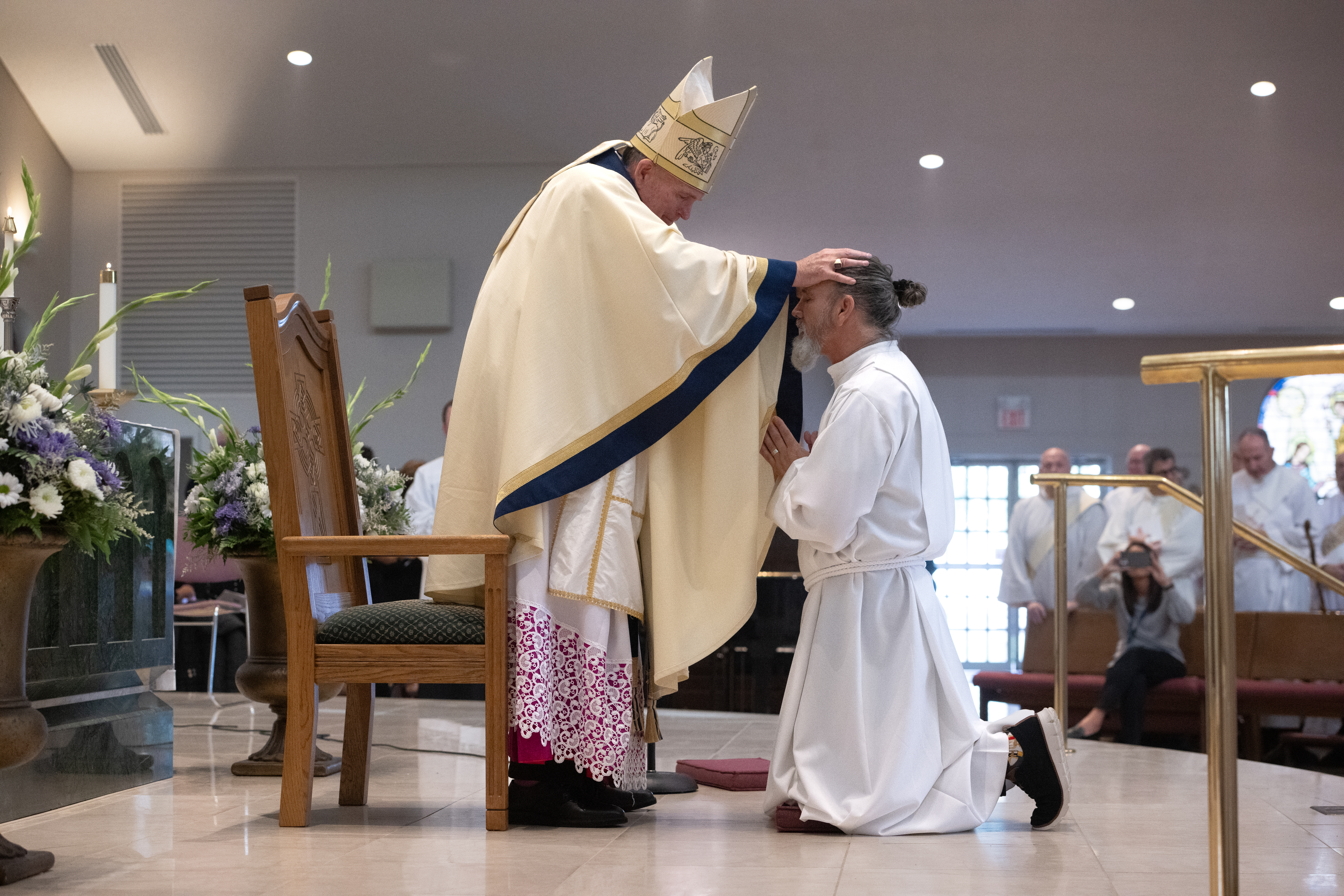 Nine men were ordained to the Sacred Order of the Diaconate for the Diocese of Trenton on Saturday, November 15, 2025, during a solemn liturgy celebrated at the Co-Cathedral of St.. Robert Bellarmine in Freehold, New Jersey. Among them was Deacon “Gez” Ford, whose journey of faith and service.