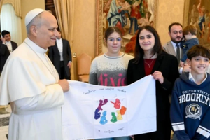 The Pope with boys and girls from Italian Catholic Action on Dec. 18, 2025.