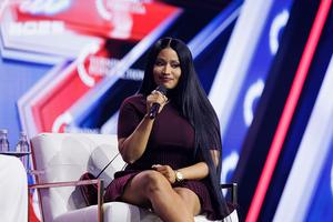 Surprise guest Nicki Minaj is interviewed by Erika Kirk on the final day of Turning Point USA’s annual AmericaFest conference at the Phoenix Convention Center on Dec. 21, 2025, in Phoenix.