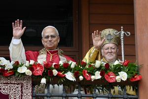 L to R: Pope Leo XIV and Orthodox Ecumenical Patriarch Bartholomew of Constantinople appear on a balcony following a Divine Liturgy at the Patriarchal Cathedral of St. George in Istanbul, Turkey, Nov. 30. 