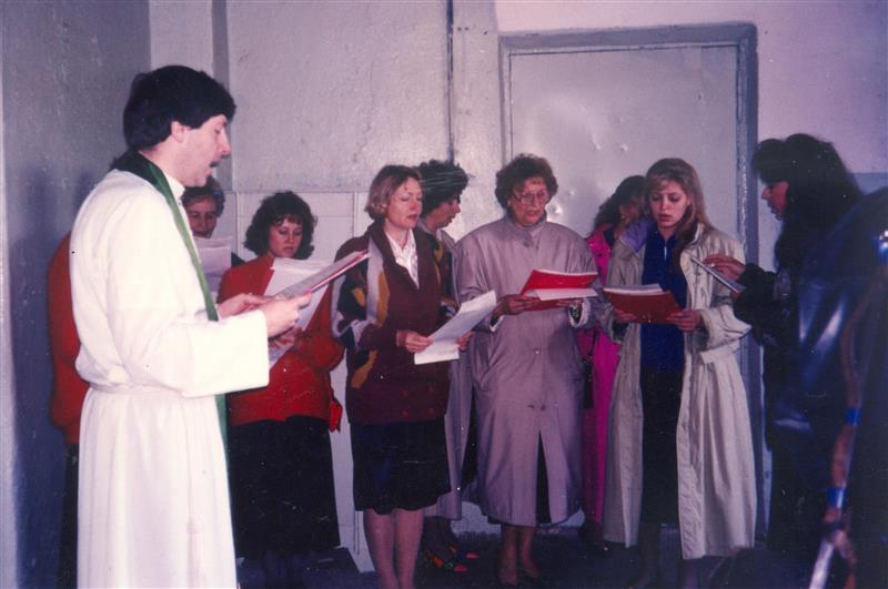 Father Daniel Maurer and the choir at Most Holy Mother of God Catholic parish, 1993