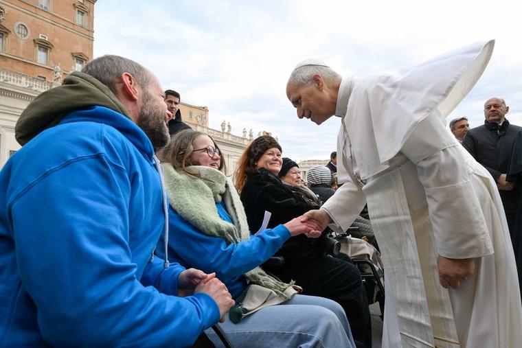 Pope Leo XIV greets pilgrims gathered for his Wednesday general audience on Dec. 31, 2025, in St. Peter’s Square at the Vatican. 