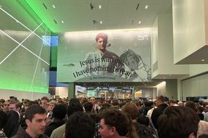 Crowds gather at SEEK 2026 beneath a photo of St. Pier Giorgio Frassati in Columbus, Ohio, on Friday, Jan. 2, 2026. 