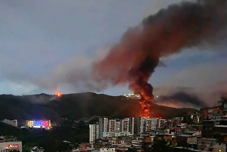 Smoke rising after large-scale strikes in Caracas, Venezuela on Jan. 3, 2025.