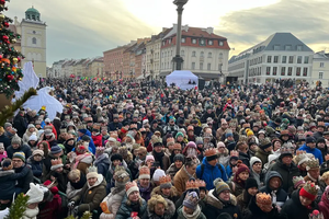 Thousands of participants with paper crowns gather on Castle Square in Warsaw during the Three Kings Procession on Tuesday, Jan. 6, 2025.