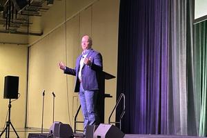 John Bishop, founder of Forge, speaks to hundreds of young men at the SEEK 2026 conference in the Diocese of Fort Worth, Texas, on Jan. 2, 2026. 