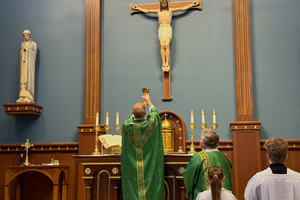 Father Scott Padrnos, a priest of the Diocese of Duluth, celebrates Mass ad orientem, or, “to the east,” at All Saints Catholic Church in Brainerd, Minnesota. In 2025, Bishop Daniel Felton issued directives to guide the use of the more traditional liturgical posture at 9 parishes.