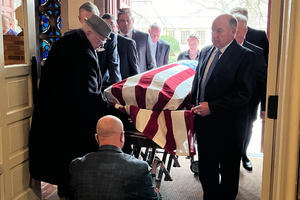 Jimmy Boehling's coffin is brought into Saint Benedict Church in Richmond, Va., on Wednesday, Jan. 14, 2026.