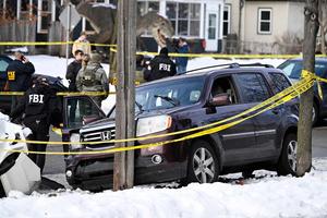 Members of law enforcement work the scene following a suspected shooting by an ICE agent during federal law enforcement operations on January 07, 2026 in Minneapolis, Minnesota. 