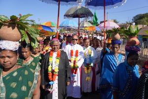 Ethnic tribal dancers lead Bishop Rabindra Kumar Ranasingh (in the middle) in procession for episcopal ordination on Jan 17 at Daringabadi in Kandhamal.                