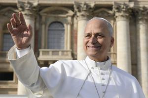 Pope Leo waves to the faithful on Dec. 20, 2025.