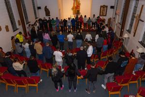 Young adults gather in prayer through Iskali.
