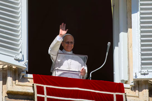 Pope Leo XIV greets pilgrims gathered in St. Peter’s Square at the Vatican for the recitation of the Angelus on Feb. 1, 2026. 