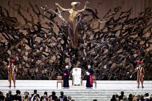 Pope Leo XIV greets members of the press during a general audience May 12, 2025, in the Paul VI Hall, beneath Fazzini’s resurrection sculpture.