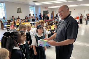 Holy Angels Academy students greet Archbishop Shelton Fabre of Louisville, Kentucky. The school is accredited by the National Association of Private Catholic and Independent Schools, which is now a subsidiary of The Cardinal Newman Society.