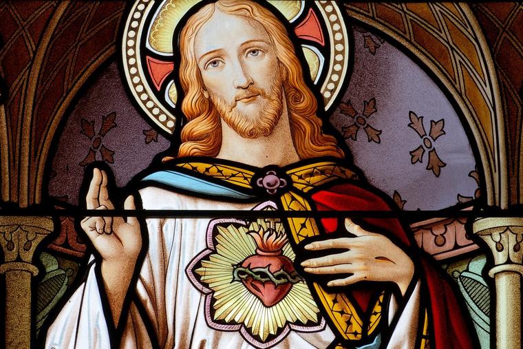 A 19th-century stained-glass window in Vernier, Switzerland, depicts the Sacred Heart of Jesus Christ.