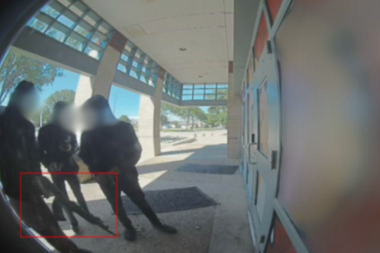 A still image from a ZeroEyes camera feed demonstrates the AI’s gun-detection system. 