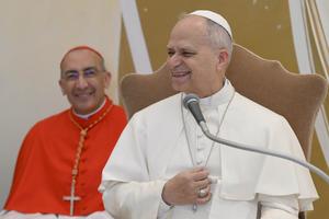 Pope Leo enjoys himself during his Feb. 22 meeting with the Salesian community at the Basilica of the Sacred Heart of Jesus in Rome.