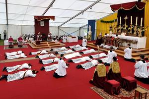 Priests and deacons take part in an ordination Mass of the Society of St. Pius X in Écône, Switzerland, on June 29, 2009.