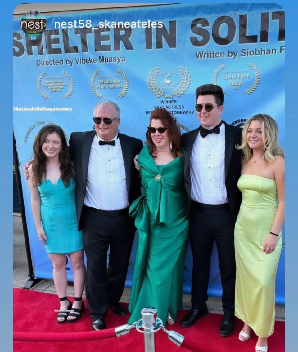 Family at Shelter in Solitude event: She is 100% sure photographer is Max Schaffner and she has permission.
