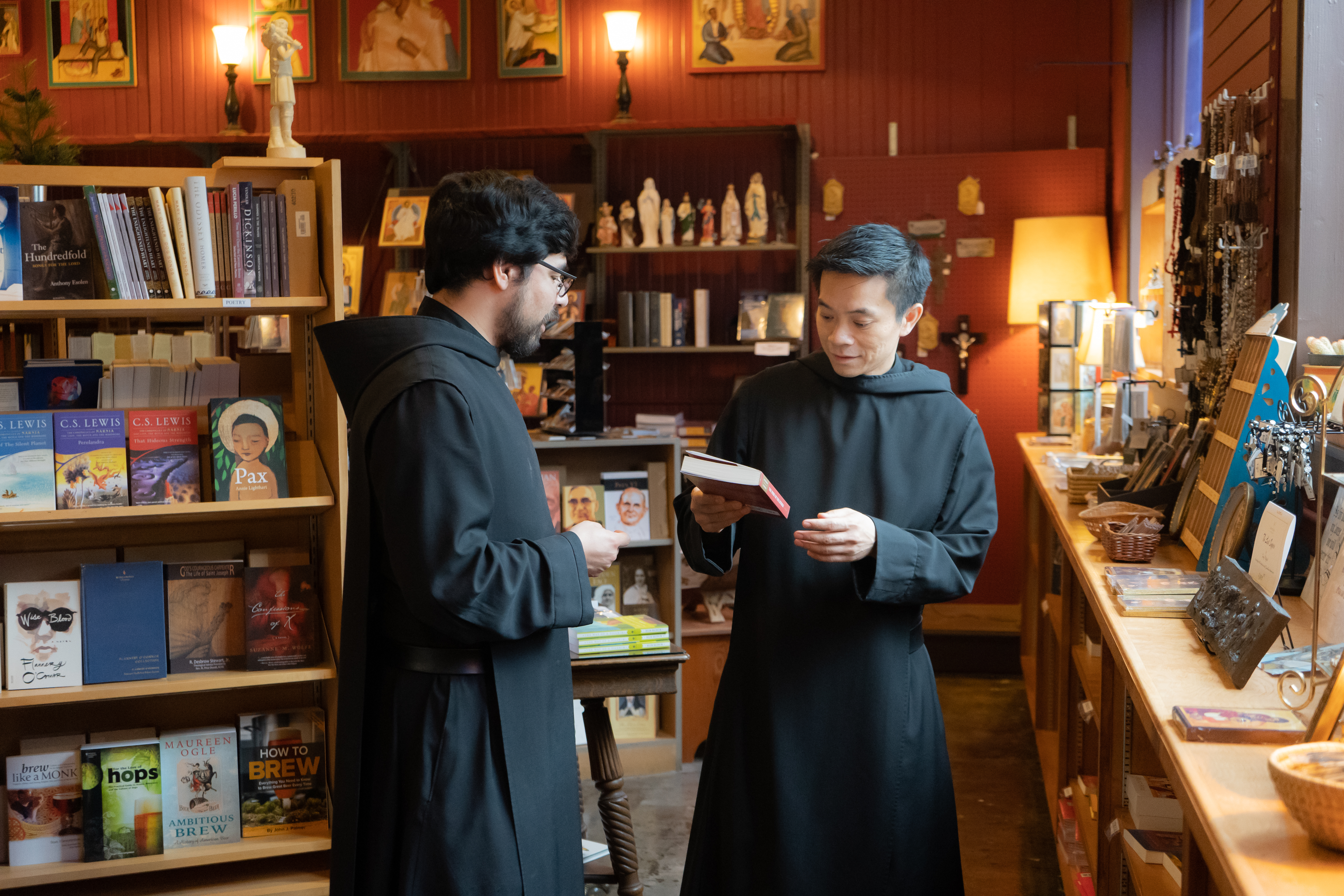 Monks peruse books at Mount Angel Abbey and Seminary. 