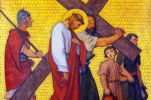 Artwork depicting St. Simon of Cyrene helping Jesus carry the cross, created in 1935 by S. G. Rudl in the Church of Sts. Cyril and Methodius (Kostel svatého Cyrila a Metoděje) in Prague.