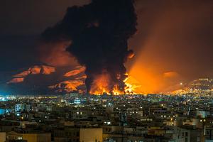 Smoke and flames rise at the site of airstrikes on an oil depot in Tehran on March 7, 2026. The United States and Israel launched strikes against Iran on Feb. 28, prompting Iranian retaliation with missile attacks across the region. 