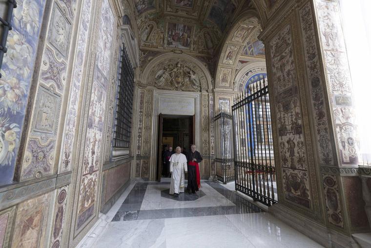 Pope Leo XIV walks in the corridor of the Third Loggia of the Apostolic Palace, where the papal apartment is located, on May 12, 2025, in Vatican City.