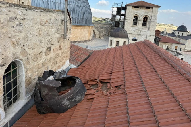 Fragments of an Iranian missile on a rooftop adjacent to the Church of the Holy Sepulchre in Jerusalem on March 16, 2026. 