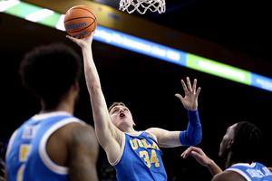 UCLA’s Tyler Bilodeau (34) drives to the basket during a game at Pauley Pavilion on Feb. 24 in Los Angeles. The Bruins are a No. 7 seed in the East Region of this year’s NCAA Tournament.