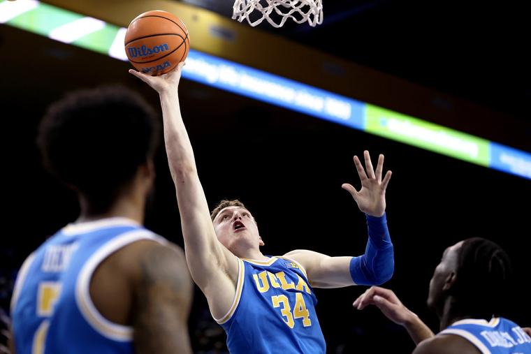 UCLA’s Tyler Bilodeau (34) drives to the basket during a game at Pauley Pavilion on Feb. 24 in Los Angeles. The Bruins are a No. 7 seed in the East Region of this year’s NCAA Tournament.