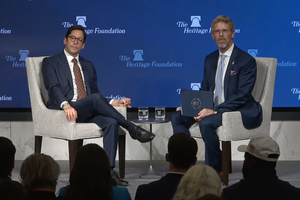 Michael Knowles of the Daily Wire talks with Jay Richards during a fireside chat hosted by the Heritage Foundation on March 19, 2026 in Washington, D.C. 