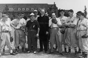 Father Edward Flanagan with baseball players at Boys Town. 