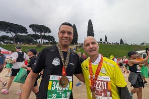 Cardinal Jean-Paul Vesco, OP, the archbishop of Algiers in Algeria (right), and Khaled Boudaoui after both men ran in the Rome Marathon on March 23, 2026.