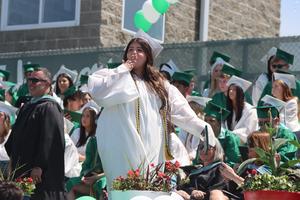 Sheridan Gorman walks across the stage during the graduation ceremony for Yorktown High School at Charlie Murphy Field, Yorktown, New York, Saturday, June 21, 2025.