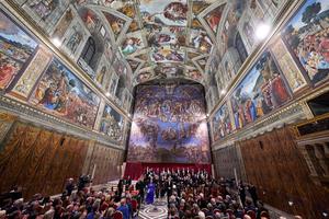 Conductor Harry Christopher and The Sixteen present ‘Angels Unawares’ byJames MacMillan in the Sistine Chapel at the Vatican on Sunday.