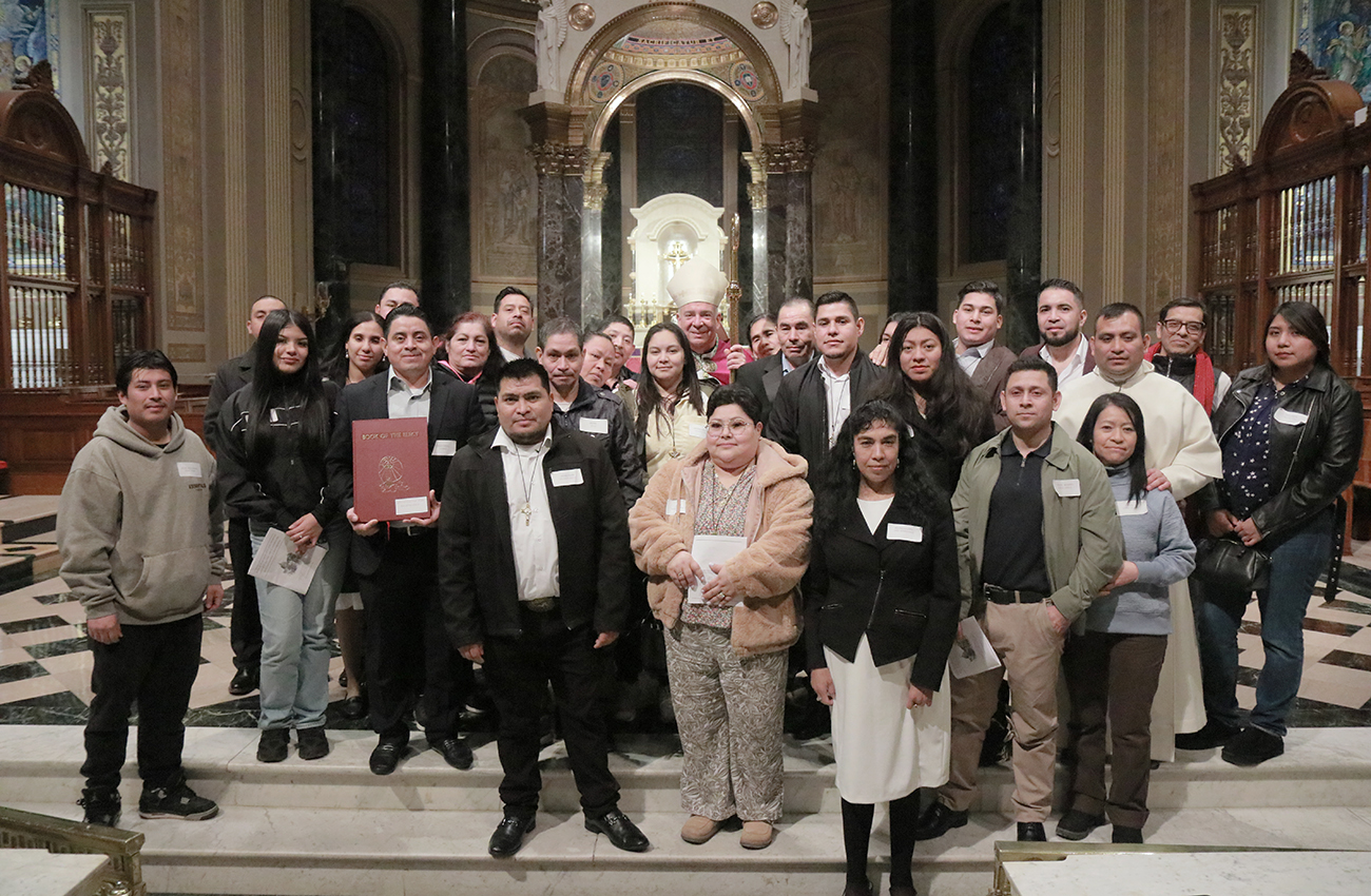 Archbishop Nelson Pérez poses with some of the catechumens entering the Catholic church this Easter during the Rite of Election liturgies on Feb. 21-22 at the Cathedral Basilica of Saints Peter and Paul in Philadelphia, Pa.