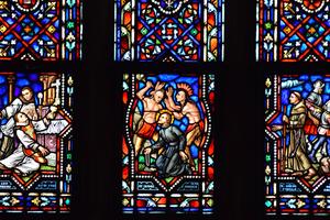 Stained-glass windows in St. Mary’s Cathedral, Ogdensburg, New York, depict three priestly martyrs, left to right: Leo Heinrichs, a German Franciscan, shot dead while celebrating Mass in 1908 in Denver; Isaac Jogues, the French Jesuit martyred in Auriesville, New York, in 1646; and Juan de Padilla, martyred in 1541 in what is now Kansas.