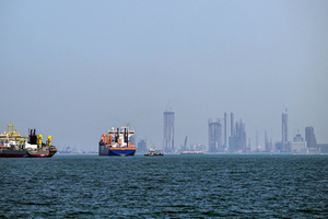 Commercial vessels are pictured offshore in Dubai on March 11, 2026.