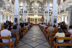 The faithful gather for the Divine Liturgy at the Mariamite Cathedral in Damascus, Syria, on June 30, 2025. 