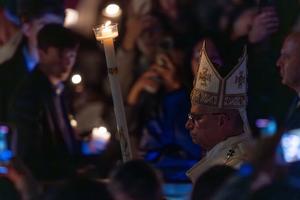 Pope Leo XIV presides over the Easter Vigil at St. Peter’s Basilica, Saturday, April 4, 2026. 