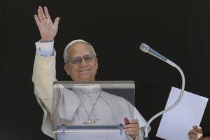 Pope Leo XIV waves to pilgrims gathered in St. Peter’s Square for his Regina Caeli address on Easter Monday, April 6, 2026, in St. Peter’s Square at the Vatican. 