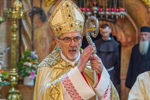 Cardinal Pierbattista Pizzaballa, Latin patriarch of Jerusalem, blesses his flock.