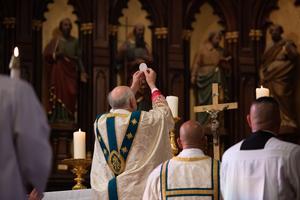 Elevation of the Eucharist during Mass at Old St. Patrick’s in New York