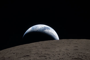Earthset captured through the Orion spacecraft window at 6:41 p.m. EDT, April 6, 2026, during the Artemis II crew’s flyby of the moon. 
