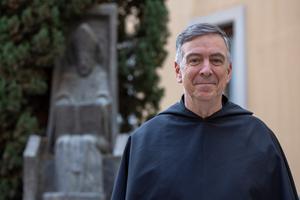 Augustinian prior general Father Joseph Farrell stands outside the order’s headquarters just outside St. Peter’s Square in Rome.