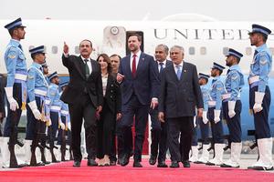 US Vice President JD Vance (C) walks with Pakistan's Chief of Defense Forces and Chief of Army Staff Field Marshall Asim Munir (L) and Pakistani Deputy Prime Minister and Foreign Minister Mohammad Ishaq Dar after arriving for talks with Iranian officials in Islamabad on April 11, 2026. 